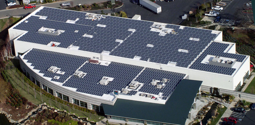 Commercial building. The roof is covered with hundreds of solar panels which are cleaned by Paul Blacks.